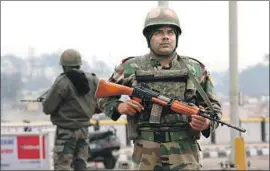  ?? Jaipal Singh EPA/Shuttersto­ck ?? INDIAN soldiers stand guard last month in Kashmir three days after a car bomb killed 40 paramilita­ry officers. False posts went viral in the days after the attack.