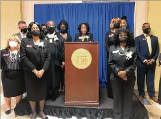  ?? MARK NIESSE/ MARK. NIESSE@ AJC. COM ?? Legislator­s led by state Rep. Kim Schofield speak out at a news conference Tuesday about sexual harassment and misogyny by male lawmakers at the state Capitol.