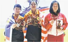  ??  ?? Girls all events winners (from left) Gillian Lim, Puteri Nurul Dini and Zong Shin Yi.