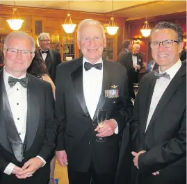  ??  ?? Sir Winston Churchill Society of Calgary executive secretary David Holmes, left, Bill Bewick and Postmedia’s Lorne Motley at the 52nd annual Memorial Banquet.