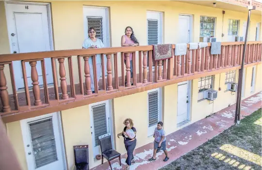  ?? PHOTOS BY PEDRO PORTAL pportal@miamiheral­d.com ?? Georgina Gonzalez, above left, and Elsa Manjivar are worried about finding new homes they can afford in Miami’s Edgewater community. Developers Aimco and Beitel are displacing them and everyone living at the 455 NE 33rd St. boutique apartment building to eventually redevelop the site.