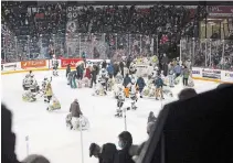  ?? JULIE JOCSAK TORSTAR FILE PHOTO ?? The Niagara IceDogs during their annual Teddy Bear Toss for victim services last December. On Tuesday, it was announced the team has been sold to a Brantford businessma­n.