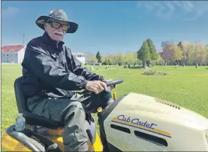  ?? JEREMY FRASER/CAPE BRETON POST ?? Chuck Porter takes a break from cutting grass on Tuesday. Porter has been cutting the grass as a volunteer at St. Stephen’s Cemetery in Florence for the past number of years. The 79-year-old uses his own sit-on lawn mower and pays for the gas with his...