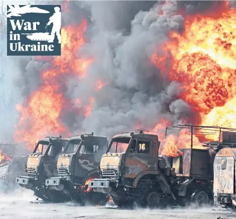  ?? ?? BLITZ: Vehicles on fire at an oil depot after missiles struck the facility in an area controlled by Russian-backed separatist forces in Makiivka, 15km (9 miles) east of Donetsk, eastern Ukraine, yesterday
