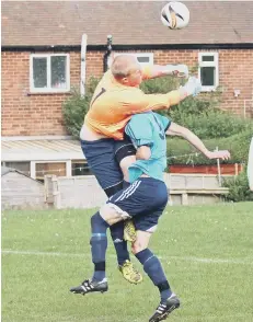  ??  ?? Newlands’ Dan Freer is clattered by the Brooklyn goalkeeper