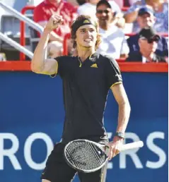  ?? AFP ?? Alexander Zverev (pictured) reacts after scoring against Roger Federer during the Rogers Cup in Montreal, Quebec, Canada.