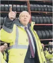  ??  ?? Prime Minister Boris Johnson takes questions during his visit.