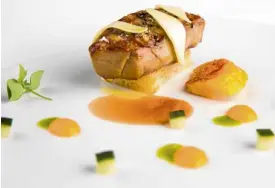  ??  ?? Grilled-smoked foie gras on brioche, served with slice green mango, grilled mango roti, mango coulis with parsley oil finished with pickled cucumber and chicken jus