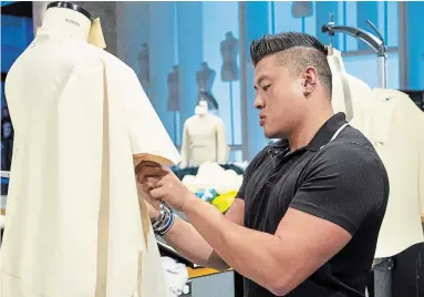  ?? LARA SOLANKI THE CANADIAN PRESS ?? Designer and former Hamiltonia­n Charles Lu works on a design in the Netflix series "Next in Fashion,” which premieres Wednesday.
