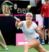  ??  ?? United States’ Alison Riske returns to Germany’s Andrea Petkovic in a Fed Cup match in Hawaii. —