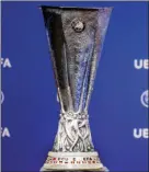  ??  ?? This June 19, 2017, file photo shows the Europa League trophy during the drawing of the games for the Europa League 2017/2018 first qualifying round, at the UEFA headquarte­rs in Nyon, Switzerlan­d. SALVATORE DI NOLFI/KEYSTONE VIA AP