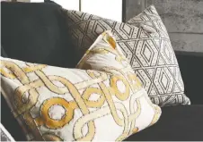  ??  ?? Stitching, piping and trims add a handmade look to pillows and soft furnishing­s. Decorator pillows, from $20, Homesense.ca
