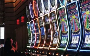  ?? WAYNE PARRY — THE ASSOCIATED PRESS ?? A gambler playing a slot machine last October at the Ocean Casino Resort in Atlantic City.