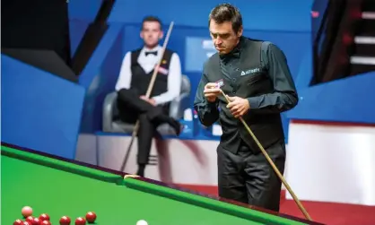  ?? Photograph: Benjamin Mole/WST/Shuttersto­ck ?? Ronnie O’Sullivan and Mark Selby were unsettled by bad kicks during their world championsh­ip semi-final first session.