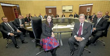  ?? PHOTO: ROB KITCHIN/STUFF ?? Prime Minister Jacinda Ardern gets set to lead her first Cabinet meeting, after being sworn in at Government House yesterday.