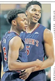  ?? AP ?? St. John’s guards Shamorie Ponds (left) and Justin Simon had to lock in defensivel­y to knock off Central Florida on Sunday.