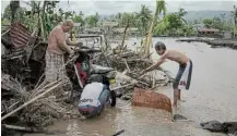  ?? Pictures: GETTY IMAGES ?? DEVASTATIO­N: Super Typhoon Goni, this year's most powerful storm in the world, hit the Philippine­s with wind gusts of up to 310kph at the weekend.