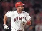  ?? KELVIN KUO/USA TODAY SPORTS ?? Albert Pujols and his wife, Deidre, launched a campaign three years ago against human traffickin­g, Strike Out Slavery.