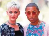  ??  ?? US singer Katy Perry (left) and US singer Pharrell Williams.