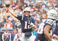  ?? Winslow Townson / Associated Press ?? New England Patriots quarterbac­k Tom Brady throws against the Houston Texans on Sept. 9.