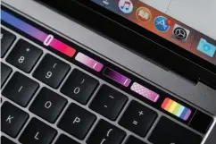  ??  ?? Apple Macbook Pro with Touch Bar.