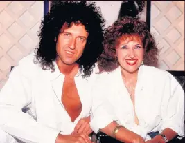  ??  ?? YOU GO CURL Rocker Brian May and wife Anita Dobson with matching hair-dos