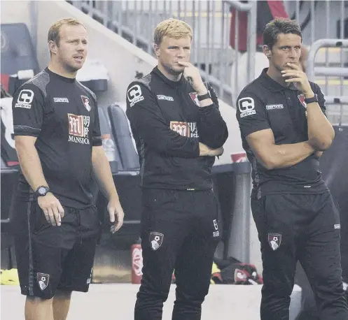  ??  ?? 0 First-team coach Simon Weathersto­ne, left, manager Eddie Howe and assistant manager Jason Tindall in their Bournemout­h days.