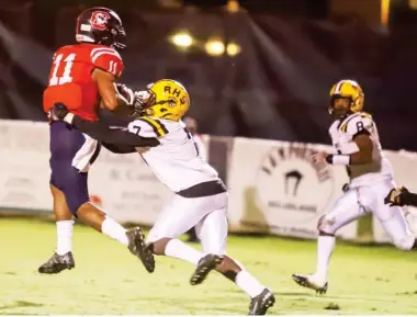  ??  ?? Choctaw County wide receiver Ques Mcneal (11) attempts to make a catch against Ripley on Friday night. (Photo by Jeremy Miller, for Starkville Daily News)