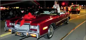  ?? CYNDY GREEN/SPECIAL TO THE NEWS-SENTINEL ?? The 23rd annual Lodi Parade of Lights officially rang in the holiday season as it entertaine­d thousands of viewers in Downtown Lodi. The Grand Marshall was Lodi native Mackenzie Freed who is the current Miss California.