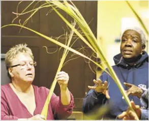  ?? Photo by Anthony Delmundo ?? Members of The Riverside Church congregati­on in Morningsid­e Heights prepare for Palm Sunday, which marks beginning of Holy Week for Christians.