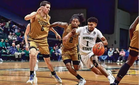  ?? JOE CRAVEN / WRIGHT STATE ATHLETICS ?? Guard Trey Calvin, Wright State’s best player, has one year of eligibilit­y remaining and, after weighing his options, has decided to stay at the school upon learning of its aggressive Name, Image and Likeness strategy.