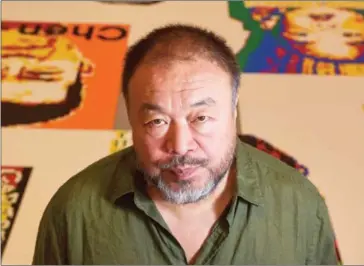  ?? JAHI CHIKWENDIU/THE WASHINGTON POST ?? Ai Weiwei, internatio­nally known artist and activist, is at the Hirshhorn Museum and Sculpture Garden in Washington, DC, for his new exhibit,