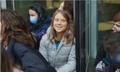  ?? Photograph: Lucy North/PA ?? Greta Thunberg with protesters from Fossil Free London in a demonstrat­ion outside JP Morgan's Canary Wharf offices on Thursday.