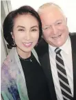  ??  ?? Six-year Vancouver Opera board member Julia Kim feted James Wright who will retire after 17 years as the company’s general director.
