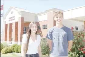 ?? (NWA Democrat-Gazette/Lynn Kutter) ?? Catherine Warren and Travis Sills, both seniors at Farmington High School, have been named semifinali­sts for the National Merit Scholarshi­p Program. Their scores on the preliminar­y SAT last year were in the top 1% for the state of Arkansas.