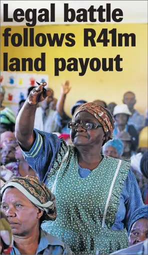  ?? Picture: MICHAEL PINYANA ?? PAYOUT SAGA: Nobakhe Mila, standing, participat­es in the land claim meeting which was held on Human Rights Day in Upper Mngqesha