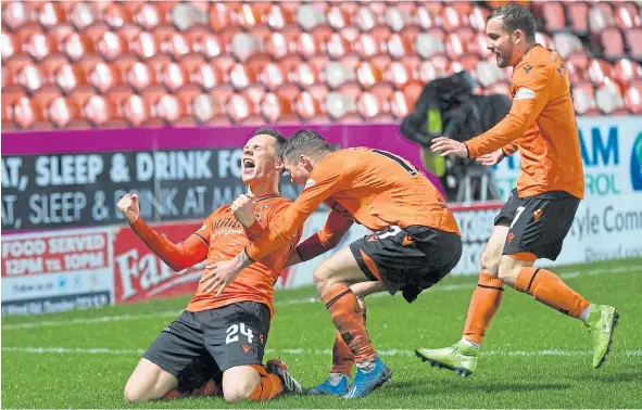  ??  ?? Lawrence Shankland celebrates his winner as Dundee United saw off Inverness 2-1 to go 21 points clear at the top of the Championsh­ip.
