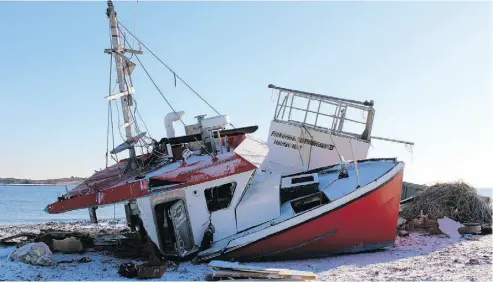  ?? COURTESY MICHAEL GEDDES ?? What was left of the Fisherman’s Provider II after it was towed back into Canso Marina.