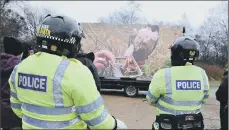  ??  ?? Top, PCSO Bryan Tongue demonstrat­es how pole traps work; above, police officers at the launch of Operation Owl.