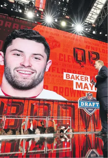  ?? RONALD MARTINEZ/GETTY IMAGES ?? Oklahoma star Baker Mayfield was the surprise No. 1 pick in Thursday’s first round of the NFL draft, going to the beleaguere­d Cleveland Browns. The 23-year-old doesn’t lack confidence, saying that “if anybody can turn that franchise around, it’d be me.”