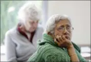  ?? MARCIO JOSE SANCHEZ — THE ASSOCIATED PRESS ?? Sara Dhamija, right, listens to a teacher Friday during an anti-bullying class at the On Lok 30th Street Senior Center in San Francisco. Nursing homes, senior centers and housing complexes for the elderly have introduced programs, training and policies...