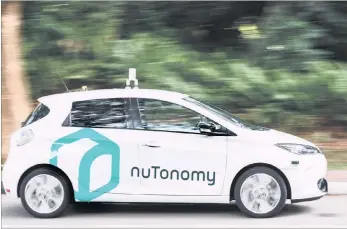  ??  ?? A nuTonomy self-driving vehicle pictured in Singapore. The developer invited a select group of people to try it’s “robo-taxi” hoping to get feedback ahead of its launch in 2018.