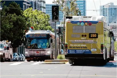  ?? Lea Suzuki/The Chronicle ?? Muni has seen estimated fare evasions have nearly doubled since 2019. The transit agency is planning to hire more fare inspectors in order to reduce the number of evasions.