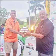  ?? Photo: SUPPLIED ?? Vijay Madhavan, left, with FGC captain Mahendran Nair
at the Fiji Golf Club.