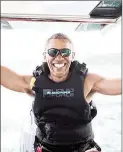  ?? Jack Brockway/Virgin Handout via (Reuters) ?? Obama sits on a boat during a kite surfing outing with British businessma­n Richard Branson during his holiday on Branson’s Moskito island, in the British Virgin Islands.