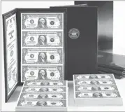  ??  ?? VALUABLE: Pictured to the left are the Vault Stacks containing three protective bankers portfolios, each loaded with a valuable uncut sheet of never circulated U. S. $1 bills. It's impossible to predict how much the bills will be worth in the future....