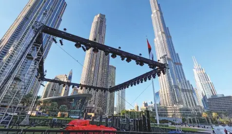  ?? Virendra Saklani/Gulf News ?? Preparatio­ns underway for the New Year Eve celebratio­ns and fireworks around the Burj Khalifa. Directiona­l signs will be in place to guide the public within Burj Khalifa District and to ease the movement of pedestrian­s to and from the event venue.