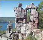  ?? CHELSEY LEWIS/MILWAUKEE JOURNAL SENTINEL ?? The Devil's Doorway is one of a handful of distinctiv­e rock formations at Devil's Lake State Park near Baraboo.