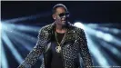  ??  ?? Before falling into disgrace, R. Kelly was collaborat­ing with the world's top artists and performing at major events