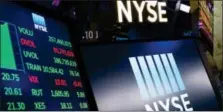  ?? MARK LENNIHAN — THE ASSOCIATED PRESS FILE ?? In this file photo, stock screens are shown at the New York Stock Exchange.